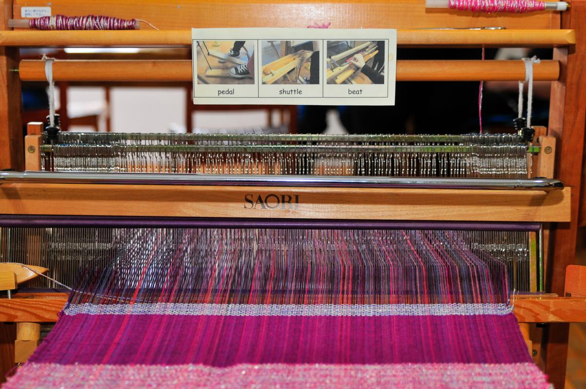 Loom with communication board on.